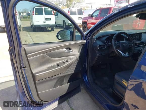 2020 Hyundai Santa Fe SE with VIN 5NMS23AD0LH141404, listed as a IAAI auction lot 41870350 with 144,109 mi miles and . Bid and sale history available at DreamBid. Image 18.