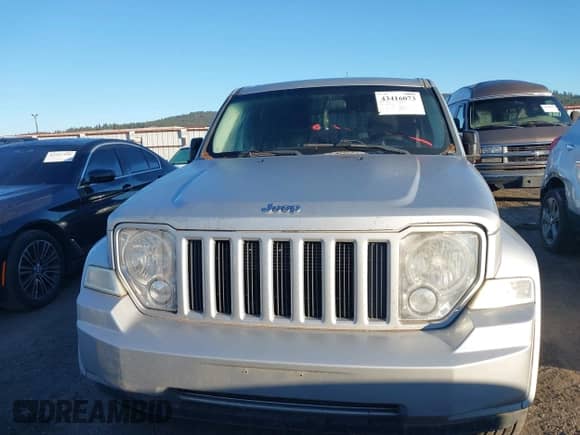 2011 Jeep Liberty Sport with VIN 1J4PN2GKXBW527234, listed as a IAAI auction lot 43416073 with 126,910 mi miles and . Bid and sale history available at DreamBid. Image 6.