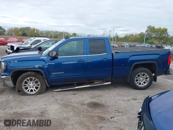 2017 GMC Sierra 1500 SLE with VIN 1GTV2MEC0HZ121919, listed as a IAAI auction lot 43460945 with 76,000 mi miles and . Bid and sale history available at DreamBid. Image 14.