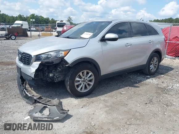 2019 Kia Sorento LX with VIN 5XYPG4A50KG564322, listed as a IAAI auction lot 43285789 with 108,164 mi miles and . Bid and sale history available at DreamBid. Image 2.