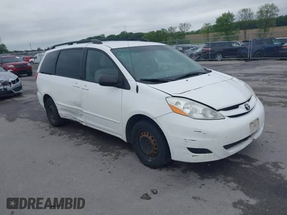 2010 Toyota Sienna CE z VIN 5TDKK4CC7AS312444, wystawiony jako IAAI lot #42291580 z przebiegiem 215 260 mil mil oraz . Historia ofert i sprzedaży dostępna na DreamBid. Obrazek 1.