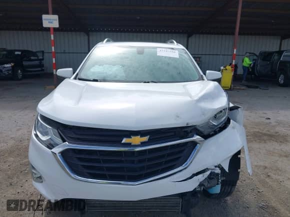 2018 Chevrolet Equinox LT z VIN 2GNAXTEX2J6238715, wystawiony jako IAAI lot #43347566 z przebiegiem 84 854 mil mil oraz . Historia ofert i sprzedaży dostępna na DreamBid. Obrazek 13.