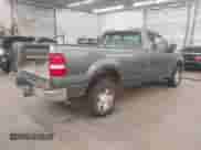 2005 Ford F-150 XL with VIN 1FTRF14W55NB90303, listed as a IAAI auction lot 43398285 with 87,559 mi miles and . Bid and sale history available at DreamBid. Image 4.