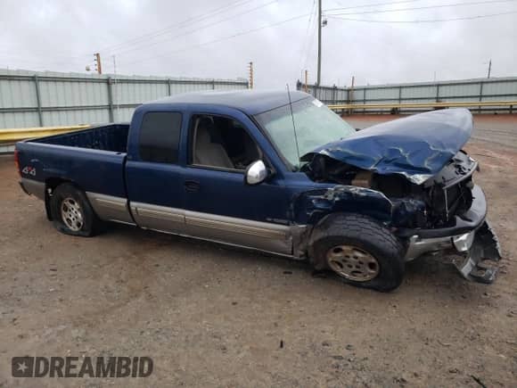 2000 Chevrolet Silverado 1500 LS with VIN 2GCEK19VXY1236322, listed as a Copart auction lot 51577915 with 243,287 mi miles and Salvage title. Bid and sale history available at DreamBid. Image 4.