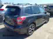 2014 Subaru Forester XT Premium with VIN JF2SJGDC0EH520728, listed as a IAAI auction lot 43336202 with 165,577 mi miles and . Bid and sale history available at DreamBid. Image 4.