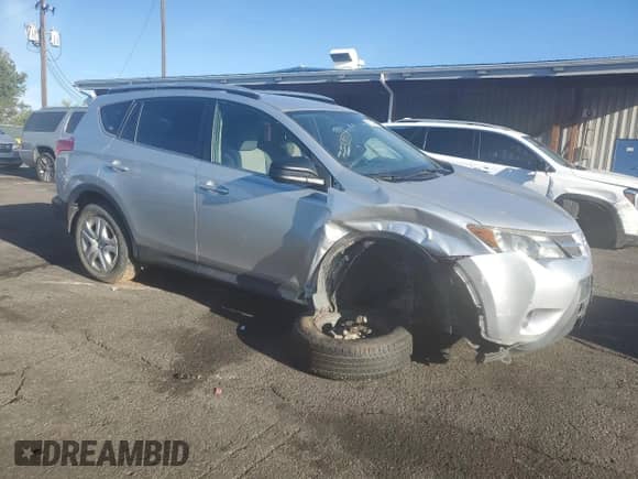2015 Toyota RAV4 LE with VIN JTMBFREV0FD118504, listed as a Copart auction lot 81213565 with 211,534 mi miles and Salvage title. Bid and sale history available at DreamBid. Image 4.