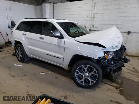 2020 Jeep Grand Cherokee Overland with VIN 1C4RJFCG4LC326287, listed as a Copart auction lot 64046885 with 202,803 mi miles and Salvage title. Bid and sale history available at DreamBid. Image 4.