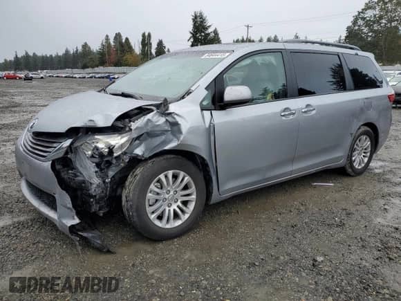 2016 Toyota Sienna XLE with VIN 5TDYK3DC9GS717149, listed as a Copart auction lot 84644415 with Not provided miles and Salvage title. Bid and sale history available at DreamBid. Image 1.