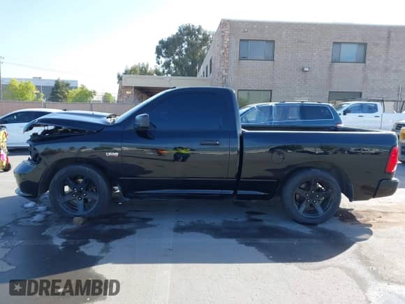 2014 Ram 1500 Express z VIN 3C6JR6ATXEG192303, wystawiony jako IAAI lot #42087281 z przebiegiem 58 597 mil mil oraz . Historia ofert i sprzedaży dostępna na DreamBid. Obrazek 15.