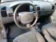 2004 Hyundai Accent GL z VIN KMHCG45C64U506817, wystawiony jako Copart lot #66365085 z przebiegiem 58 940 mil mil oraz Szkoda całkowita • Salvage title. Historia ofert i sprzedaży dostępna na DreamBid. Obrazek 8.