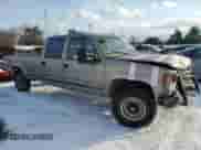 1999 Chevrolet Silverado 3500 with VIN 1GCHK33R4XF096473, listed as a Copart auction lot 87587465 with 174,424 mi miles and Salvage title. Bid and sale history available at DreamBid. Image 4.