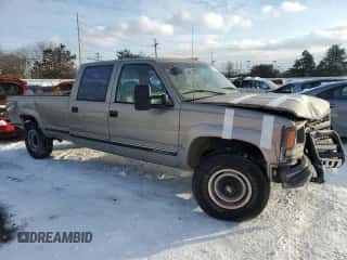 1999 Chevrolet Silverado 3500 с VIN 1GCHK33R4XF096473, выставлен на аукционе Copart как лот 87587465 с пробегом 174 424 миль миль и Списание • Salvage title. История ставок и продаж доступна на DreamBid. Изображение 4.