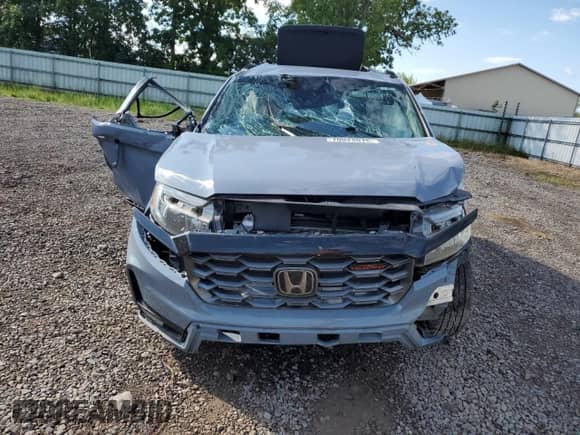 2022 Honda Passport TrailSport с VIN 5FNYF8H65NB002182, выставлен на аукционе Copart как лот 70024075 с пробегом Не указан миль и Списание • Salvage title. История ставок и продаж доступна на DreamBid. Изображение 5.