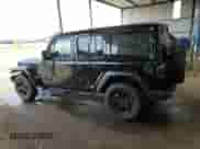 2023 Jeep Wrangler Sahara Altitude with VIN 1C4HJXEG1PW614643, listed as a Copart auction lot 52128245 with 9,890 mi miles and Clean title. Bid and sale history available at DreamBid. Image 2.