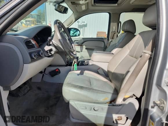 2012 Chevrolet Tahoe LT with VIN 1GNSKBE01CR170785, listed as a Copart auction lot 70306175 with 212,244 mi miles and Salvage title. Bid and sale history available at DreamBid. Image 7.