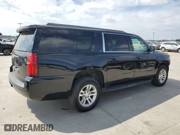 2017 Chevrolet Suburban LT z VIN 1GNSKHKC9HR166072, wystawiony jako Copart lot #37545474 z przebiegiem 190 071 mil mil oraz . Historia ofert i sprzedaży dostępna na DreamBid. Obrazek 3.