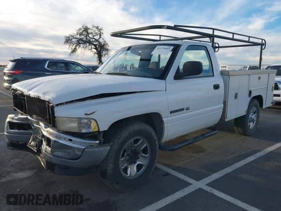 2000 Dodge RAM with VIN 3B6KC26Z9YM220266, listed as a IAAI auction lot 41279065 with 197,070 mi miles and . Bid and sale history available at DreamBid. Image 18.