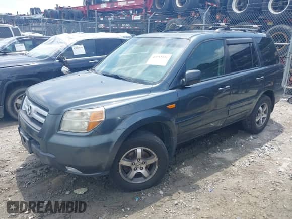 2006 Honda Pilot EX-L z VIN 5FNYF285X6B037032, wystawiony jako IAAI lot #42232591 z przebiegiem 205 551 mil mil oraz . Historia ofert i sprzedaży dostępna na DreamBid. Obrazek 17.