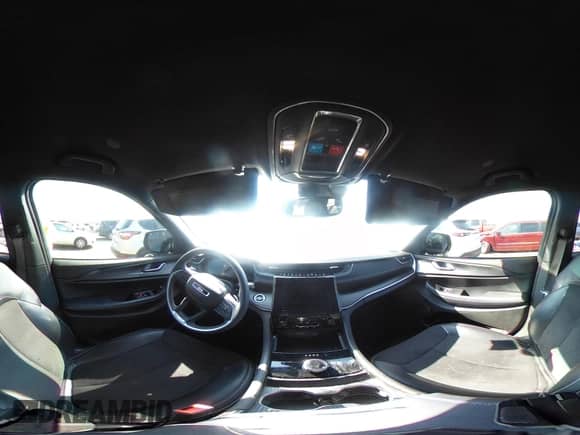 2023 Jeep Grand Cherokee Laredo with VIN 1C4RJHAG5PC659828, listed as a IAAI auction lot 43418211 with 27,942 mi miles and . Bid and sale history available at DreamBid. Image 17.