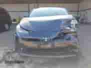 2022 Toyota Prius Nightshade with VIN JTDKAMFU4N3155017, listed as a IAAI auction lot 43013402 with 146,084 mi miles and . Bid and sale history available at DreamBid. Image 13.