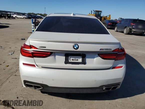 2017 BMW 7 Series with VIN WBA7H6C30HG614434, listed as a Copart auction lot 79236714 with Not provided miles and Clean title. Bid and sale history available at DreamBid. Image 6.