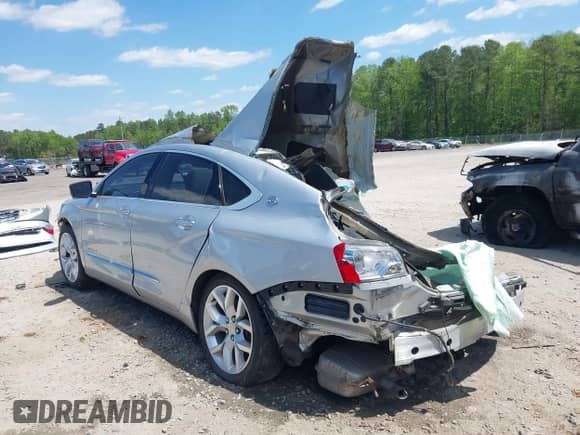 2018 Chevrolet Impala Premier with VIN 2G1125S33J9136125, listed as a IAAI auction lot 42012548 with 151,731 mi miles and . Bid and sale history available at DreamBid. Image 3.