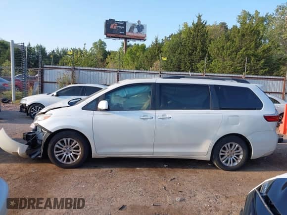 2015 Toyota Sienna XLE with VIN 5TDYK3DC5FS644523, listed as a IAAI auction lot 43248015 with 106,854 mi miles and . Bid and sale history available at DreamBid. Image 14.