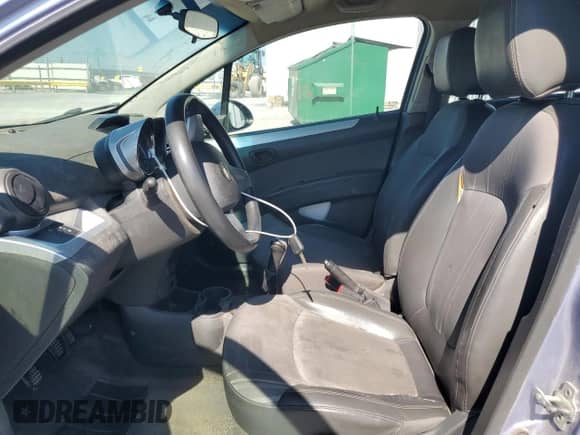 2014 Chevrolet Spark LS with VIN KL8CA6S93EC585096, listed as a Copart auction lot 86459005 with 128,887 mi miles and Salvage title. Bid and sale history available at DreamBid. Image 7.