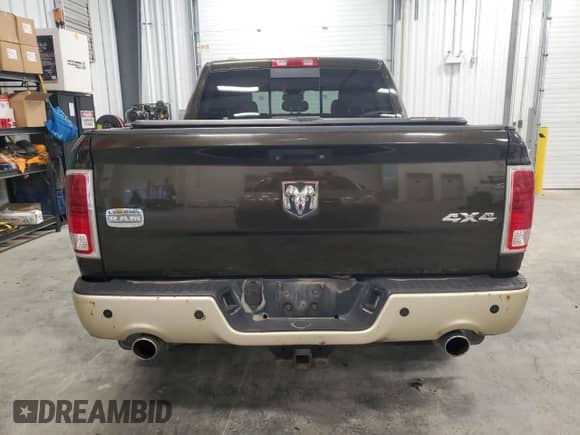 2013 Ram 1500 Laramie Longhorn z VIN 1C6RR7PT7DS679255, wystawiony jako Copart lot #68107465 z przebiegiem 296 504 mil mil oraz Czysty tytuł • Clean title. Historia ofert i sprzedaży dostępna na DreamBid. Obrazek 6.