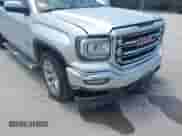2018 GMC Sierra 1500 SLT z VIN 3GTP1NECXJG347361, wystawiony jako IAAI lot #42897583 z przebiegiem 166 607 mil mil oraz . Historia ofert i sprzedaży dostępna na DreamBid. Obrazek 6.