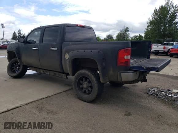 2012 Chevrolet Silverado 1500 LTZ with VIN 3GCPKTE72CG296137, listed as a Copart auction lot 56320765 with 180,551 mi miles and Salvage title. Bid and sale history available at DreamBid. Image 2.