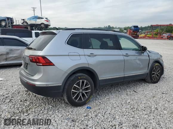 2020 Volkswagen Tiguan SE с VIN 3VV3B7AX0LM086991, выставлен на аукционе Copart как лот 67039875 с пробегом 92 931 миль миль и Списание • Salvage title. История ставок и продаж доступна на DreamBid. Изображение 3.