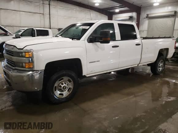 2015 Chevrolet Silverado 2500HD Work Truck z VIN 1GC1KUEG7FF649263, wystawiony jako Copart lot #44401835 z przebiegiem 184 654 mil mil oraz Szkoda całkowita • Salvage title. Historia ofert i sprzedaży dostępna na DreamBid. Obrazek 1.