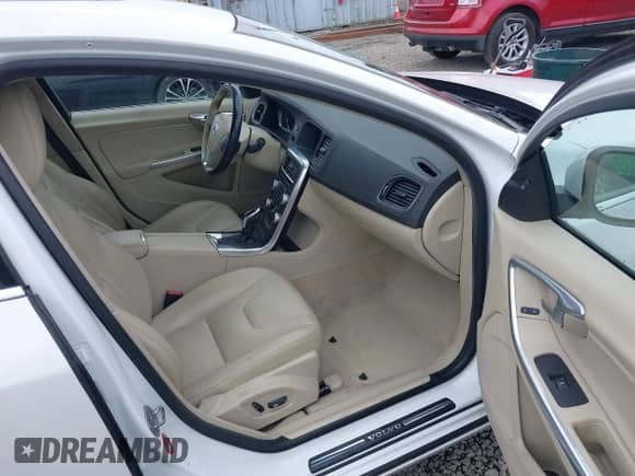 2015 Volvo S60 T5 Drive-E Premier with VIN YV140MFK2F2339819, listed as a IAAI auction lot 42651504 with 127,550 mi miles and . Bid and sale history available at DreamBid. Image 5.
