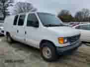 2003 Ford Econoline Cargo z VIN 1FTRE14263HB60156, wystawiony jako Copart lot #85138954 z przebiegiem 202 624 mil mil oraz Czysty tytuł • Clean title. Historia ofert i sprzedaży dostępna na DreamBid. Obrazek 4.