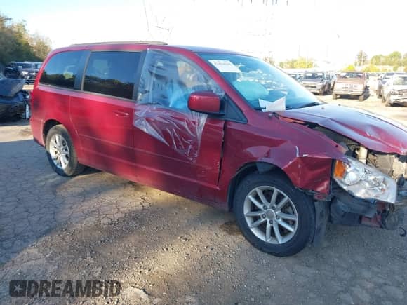 2016 Dodge Grand Caravan SXT with VIN 2C4RDGCG4GR161335, listed as a IAAI auction lot 43414142 with 124,679 mi miles and . Bid and sale history available at DreamBid. Image 1.