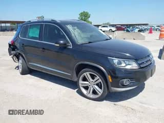 2014 Volkswagen Tiguan SEL with VIN WVGAV3AX4EW025339, listed as a IAAI auction lot 42313665 with 96,756 mi miles and . Bid and sale history available at DreamBid. Image 1.