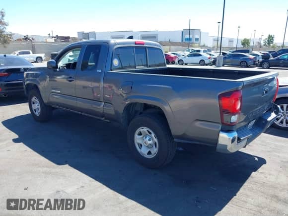 2018 Toyota Tacoma SR with VIN 5TFRX5GN1JX118441, listed as a IAAI auction lot 41870266 with 95,612 mi miles and . Bid and sale history available at DreamBid. Image 3.