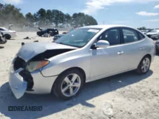 2010 Hyundai Elantra Blue с VIN KMHDU4AD3AU148051, выставлен на аукционе Copart как лот 71119515 с пробегом 195 096 миль миль и Списание • Salvage title. История ставок и продаж доступна на DreamBid. Изображение 1.