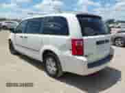 2010 Dodge Grand Caravan Cargo with VIN 2D4CN1AEXAR352270, listed as a IAAI auction lot 42826385 with 194,801 mi miles and . Bid and sale history available at DreamBid. Image 3.