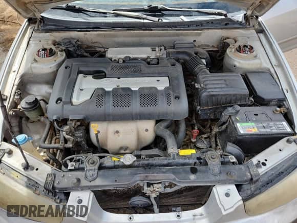 2003 Hyundai Elantra GLS с VIN KMHDN45D63U477319, выставлен на аукционе Copart как лот 71178145 с пробегом Не указан миль и Списание • Salvage title. История ставок и продаж доступна на DreamBid. Изображение 11.