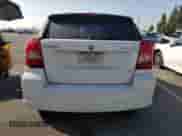 2010 Dodge Caliber SXT with VIN 1B3CB4HA3AD595658, listed as a Copart auction lot 85376495 with 209,626 mi miles and Salvage title. Bid and sale history available at DreamBid. Image 6.