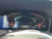 2023 BMW 4 Series 430i with VIN WBA23AT03PCL56790, listed as a Copart auction lot 55554825 with 9,747 mi miles and Salvage title. Bid and sale history available at DreamBid. Image 9.