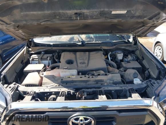 2022 Toyota Tundra SR5 with VIN 5TFLA5DB1NX036023, listed as a IAAI auction lot 42572286 with 51,073 mi miles and . Bid and sale history available at DreamBid. Image 10.