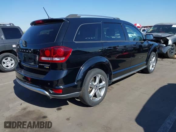 2017 Dodge Journey Crossroad with VIN 3C4PDCGGXHT626483, listed as a IAAI auction lot 42096991 with 104,259 mi miles and . Bid and sale history available at DreamBid. Image 4.
