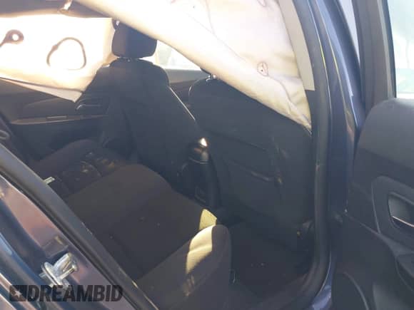 2014 Chevrolet Cruze 1LT z VIN 1G1PC5SB7E7144699, wystawiony jako IAAI lot #43241551 z przebiegiem 156 411 mil mil oraz . Historia ofert i sprzedaży dostępna na DreamBid. Obrazek 8.