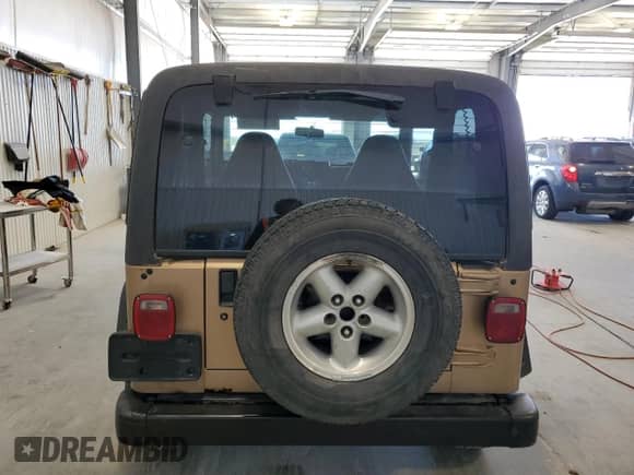 1999 Jeep Wrangler Sport with VIN 1J4FY19S6XP430964, listed as a Copart auction lot 85937775 with 109,444 mi miles and Clean title. Bid and sale history available at DreamBid. Image 6.