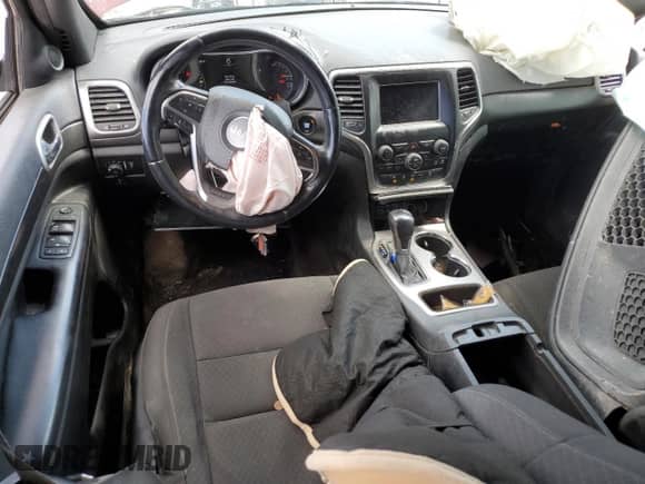 2018 Jeep Grand Cherokee Laredo E с VIN 1C4RJEAG7JC359164, выставлен на аукционе Copart как лот 69985915 с пробегом 125 918 миль миль и Списание • Salvage title. История ставок и продаж доступна на DreamBid. Изображение 8.