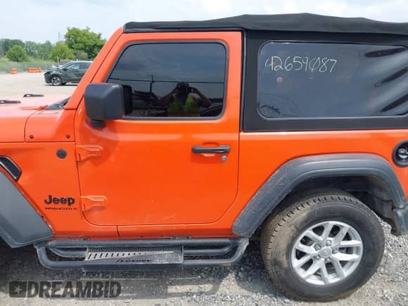 2023 Jeep Wrangler Sport with VIN 1C4HJXAG1PW692362, listed as a IAAI auction lot 42659087 with 52,179 mi miles and . Bid and sale history available at DreamBid. Image 14.