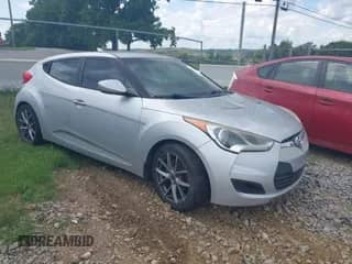 2012 Hyundai Veloster w/Black Int с VIN KMHTC6AD7CU042053, выставлен на аукционе IAAI как лот 42785973 с пробегом 164 030 миль миль и . История ставок и продаж доступна на DreamBid. Изображение 1.